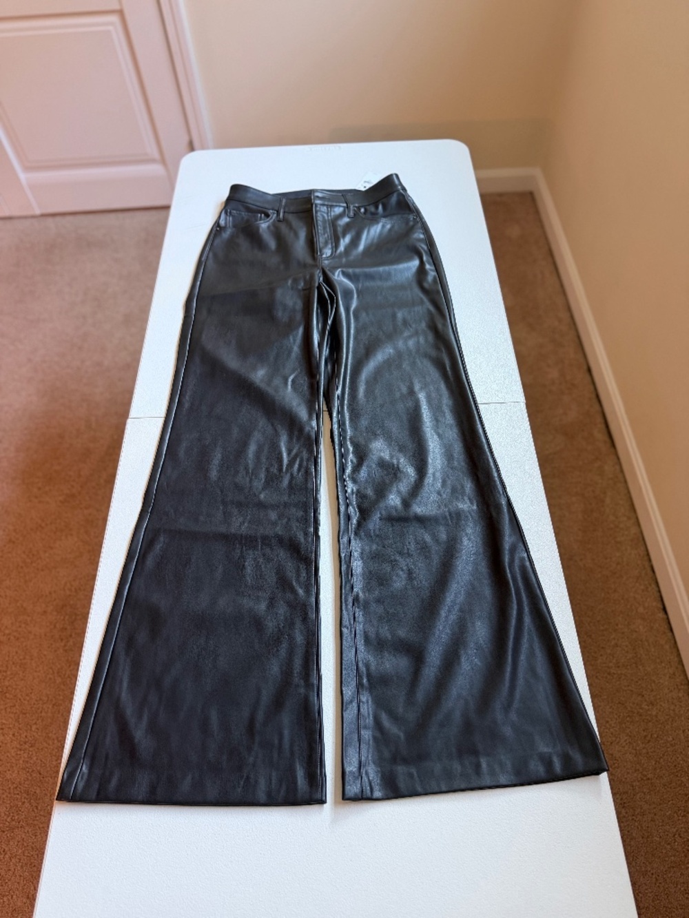 Express faux leather flare pants.